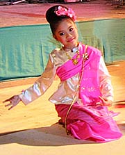 'Girl on a Theater Stage, Performing Thai Dance in Chiang Mai' by Asienreisender